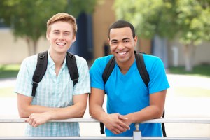 two teenagers smiling together